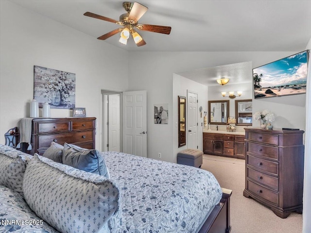 1992 Hackamore Ln, Gardnerville, NV 89410 - bedroom with vaulted ceiling, light carpet, ensuite bath, and ceiling fan