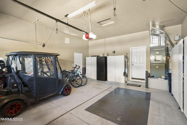 2698 Wind Feather Trl, Reno, NV 89511 - garage featuring a garage door opener