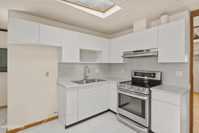 2480 Courtland Way, Sparks, NV 89431 - kitchen with electric range, under cabinet range hood, a sink, a skylight, and light countertops