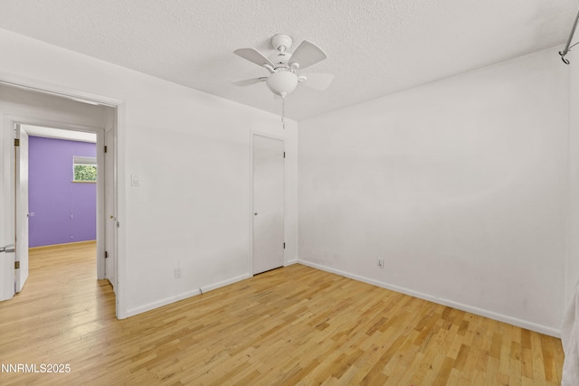 2480 Courtland Way, Sparks, NV 89431 - spare room with light wood-style flooring, ceiling fan, baseboards, and a textured ceiling