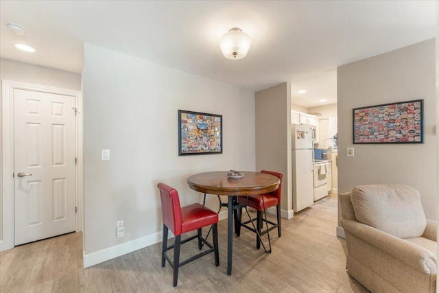 2249 Kietzke Ln Apt C, Reno, NV 89502 - dining space with light wood-style flooring, baseboards, and recessed lighting