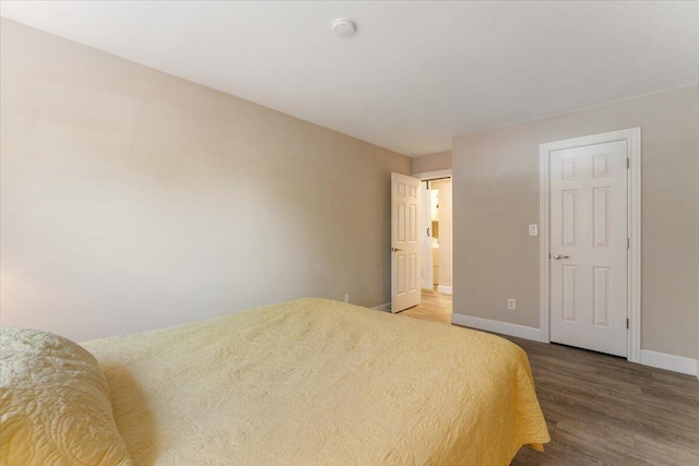 2249 Kietzke Ln Apt C, Reno, NV 89502 - bedroom featuring wood finished floors and baseboards