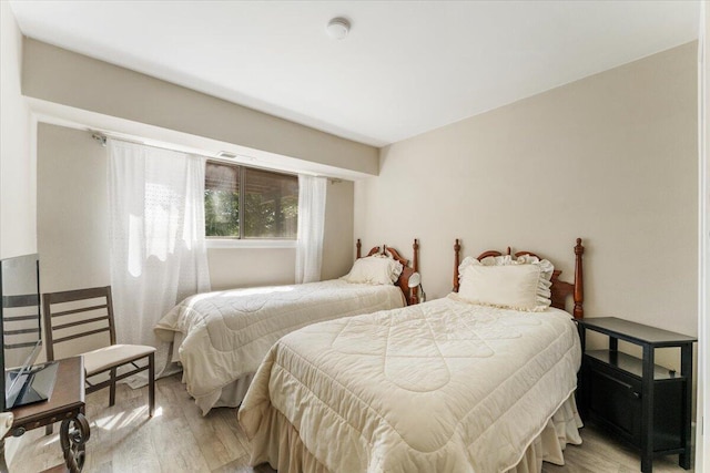 2249 Kietzke Ln Apt C, Reno, NV 89502 - bedroom with light wood-type flooring