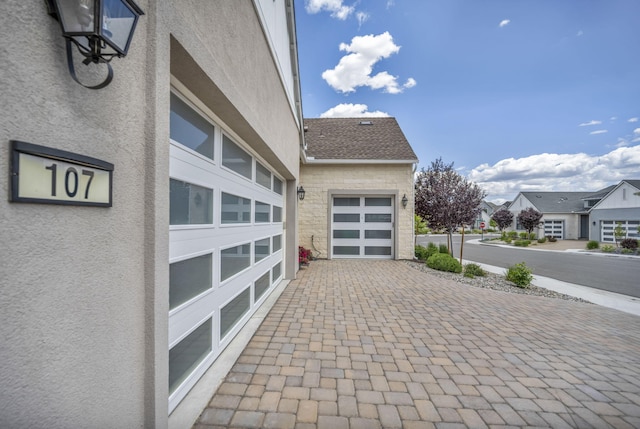 107 Bridlemoor Ct, Reno, NV 89511 - garage with decorative driveway