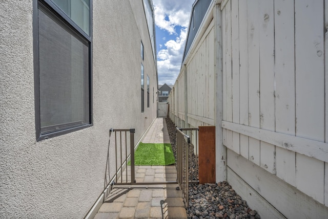 107 Bridlemoor Ct, Reno, NV 89511 - view of property exterior with stucco siding and fence