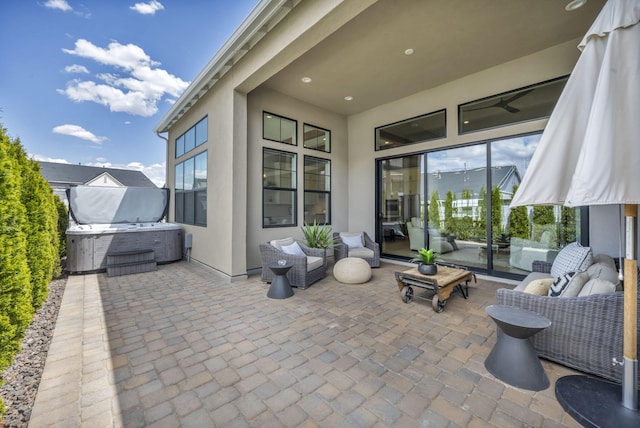 107 Bridlemoor Ct, Reno, NV 89511 - view of patio featuring a hot tub, an outdoor hangout area, and a ceiling fan