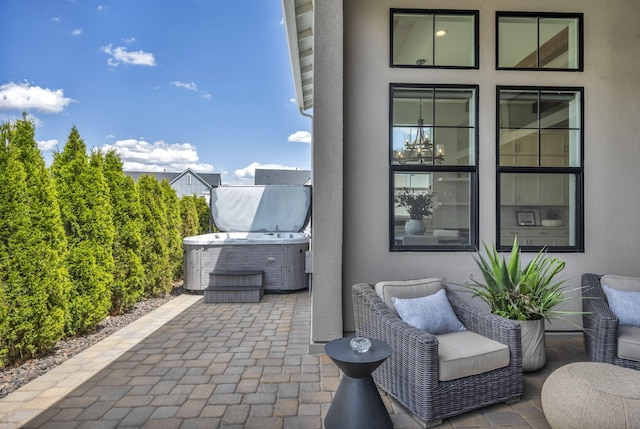 107 Bridlemoor Ct, Reno, NV 89511 - view of patio / terrace with a hot tub and central AC