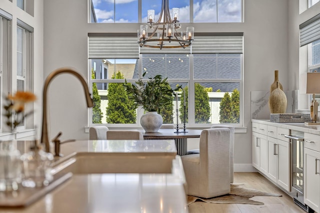 107 Bridlemoor Ct, Reno, NV 89511 - dining room featuring a chandelier and light wood-style flooring