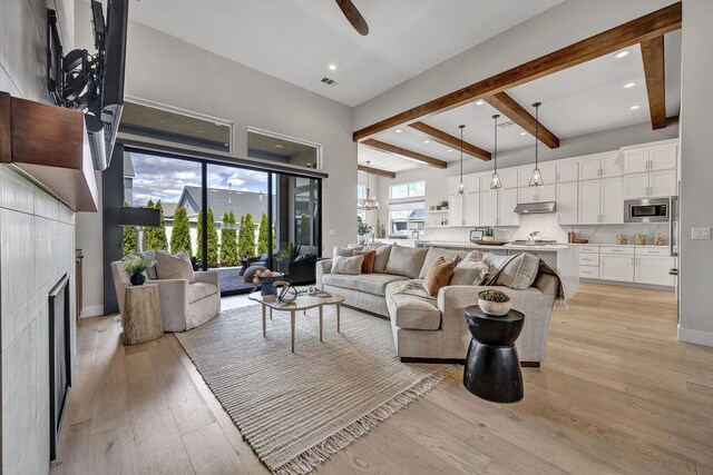 107 Bridlemoor Ct, Reno, NV 89511 - living room featuring beam ceiling, light wood-style flooring, a ceiling fan, recessed lighting, and baseboards