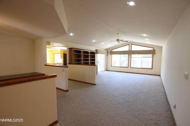 403 Ironwood Ct, Yerington, NV 89447 - unfurnished room with baseboards, vaulted ceiling, ceiling fan, light carpet, and recessed lighting