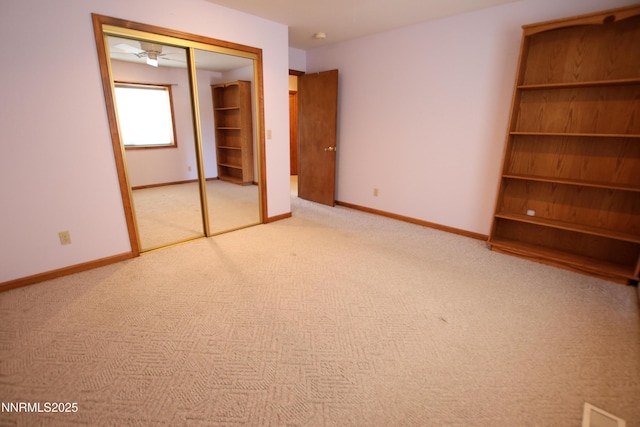 403 Ironwood Ct, Yerington, NV 89447 - unfurnished bedroom featuring carpet flooring, a closet, and baseboards