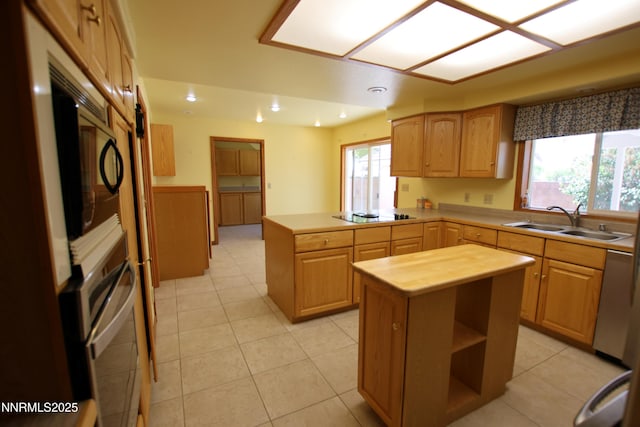 403 Ironwood Ct, Yerington, NV 89447 - kitchen with a sink, black appliances, a peninsula, butcher block countertops, and recessed lighting