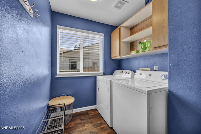 45 Stormy Ct, Sparks, NV 89436 - laundry area featuring washer and clothes dryer, cabinet space, dark wood-style floors, baseboards, and a textured wall