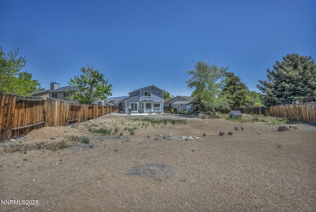 45 Stormy Ct, Sparks, NV 89436 - rear view of house with a fenced backyard