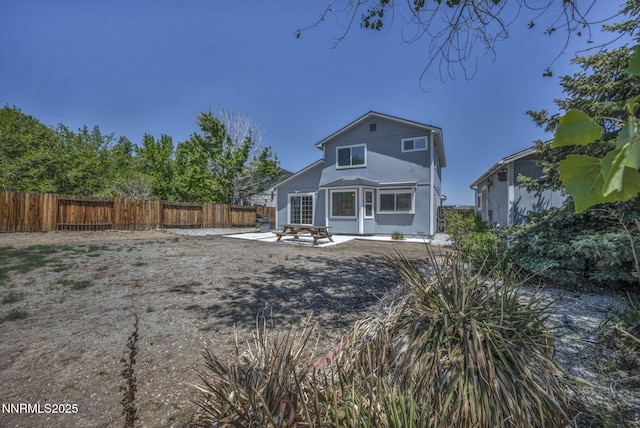 45 Stormy Ct, Sparks, NV 89436 - back of property with a fenced backyard and a patio