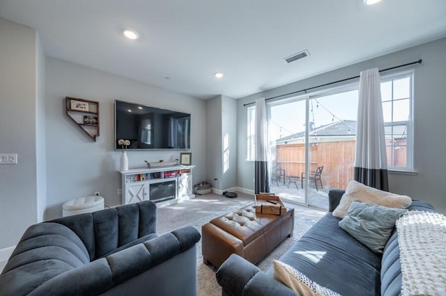 1855 Dark Horse Rd Unit B, Reno, NV 89521 - carpeted living area with baseboards, a glass covered fireplace, and recessed lighting