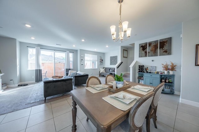 1855 Dark Horse Rd Unit B, Reno, NV 89521 - dining space with light tile patterned floors, a chandelier, recessed lighting, and baseboards