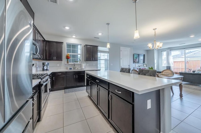 1855 Dark Horse Rd Unit B, Reno, NV 89521 - kitchen featuring appliances with stainless steel finishes, open floor plan, recessed lighting, a chandelier, and healthy amount of natural light