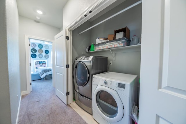 1855 Dark Horse Rd Unit B, Reno, NV 89521 - laundry area with washing machine and clothes dryer and light carpet