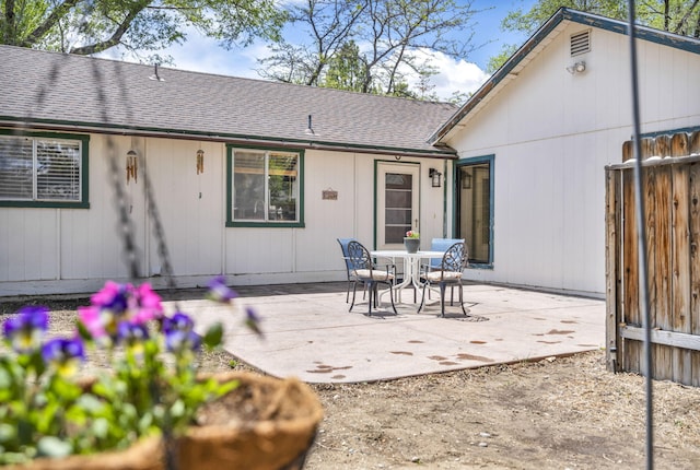 3760 Brant St, Reno, NV 89508 - back of house with a shingled roof and a patio area
