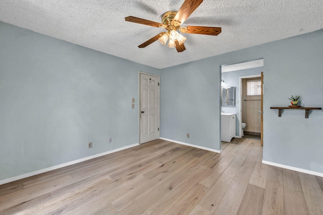 3760 Brant St, Reno, NV 89508 - spare room with a ceiling fan, light wood-style floors, a textured ceiling, and baseboards