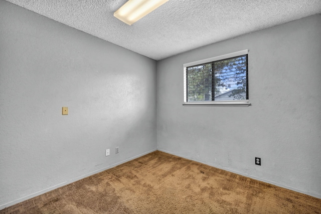 3760 Brant St, Reno, NV 89508 - carpeted spare room with a textured ceiling, baseboards, and a textured wall