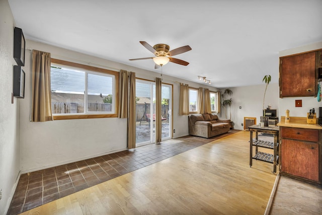3760 Brant St, Reno, NV 89508 - living area featuring ceiling fan, baseboards, and wood finished floors