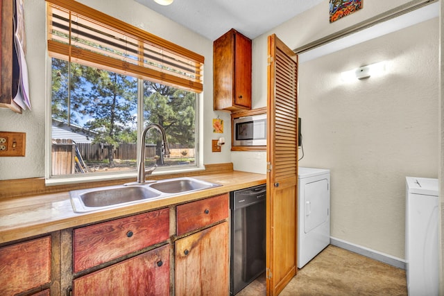 3760 Brant St, Reno, NV 89508 - kitchen with dishwasher, a sink, stainless steel microwave, a textured wall, and independent washer and dryer
