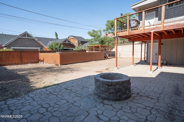 435 Ardmore Dr, Reno, NV 89509 - view of patio / terrace with an outdoor fire pit and a wooden deck