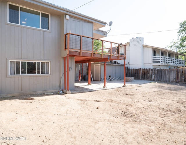 435 Ardmore Dr, Reno, NV 89509 - rear view of house featuring a deck and a patio area