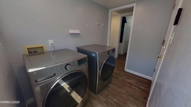 6042 Walnut Creek Rd, Reno, NV 89523 - laundry room with washer and dryer and dark wood-style flooring