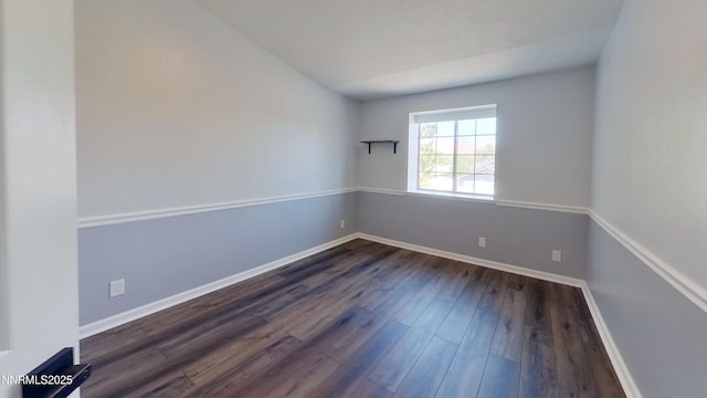 6042 Walnut Creek Rd, Reno, NV 89523 - spare room with dark wood-style flooring and baseboards