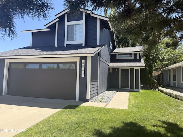 6042 Walnut Creek Rd, Reno, NV 89523 - view of front of property featuring concrete driveway, a front lawn, a garage, and roof with shingles