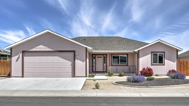 772 Megan Way, Fallon, NV 89406 - ranch-style home with an attached garage, fence, covered porch, driveway, and a shingled roof