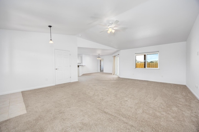 772 Megan Way, Fallon, NV 89406 - unfurnished living room featuring ceiling fan, carpet flooring, lofted ceiling, baseboards, and a chandelier
