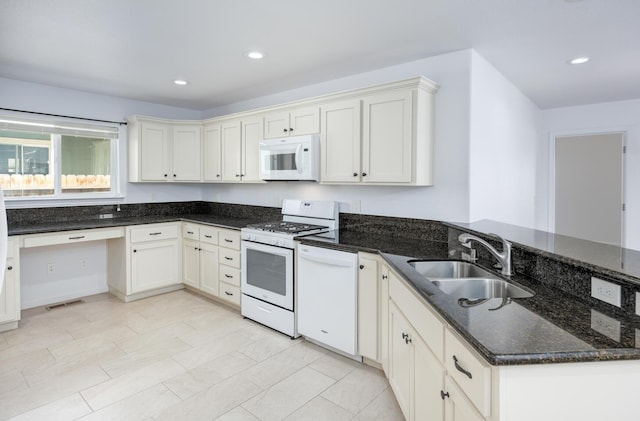 772 Megan Way, Fallon, NV 89406 - kitchen featuring white appliances, a peninsula, a sink, dark stone countertops, and recessed lighting