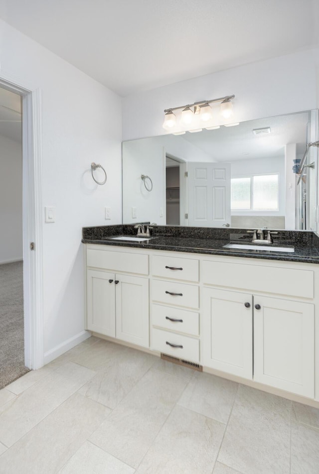 772 Megan Way, Fallon, NV 89406 - bathroom with double vanity and a shower