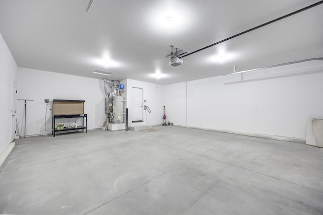 772 Megan Way, Fallon, NV 89406 - garage with a garage door opener and strapped water heater