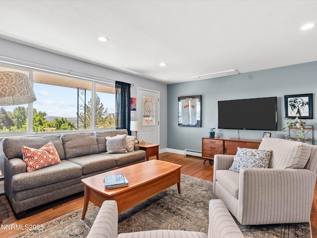 60 Redstone Dr, Reno, NV 89512 - living area featuring a baseboard heating unit, recessed lighting, wood finished floors, and baseboards
