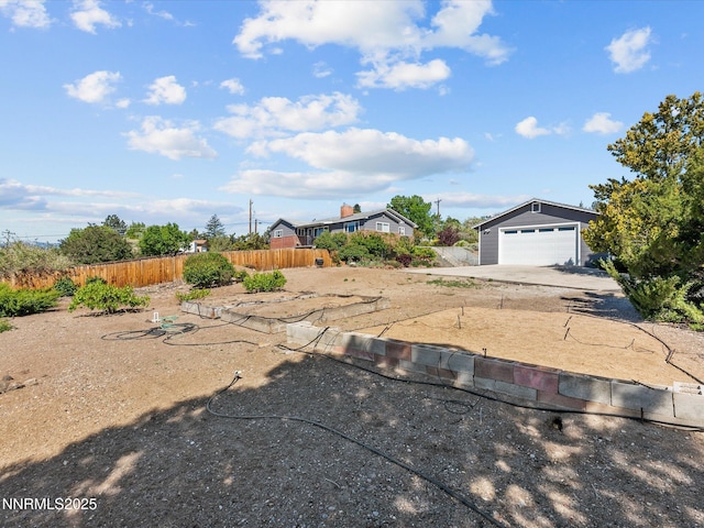 60 Redstone Dr, Reno, NV 89512 - view of yard with an outbuilding and driveway
