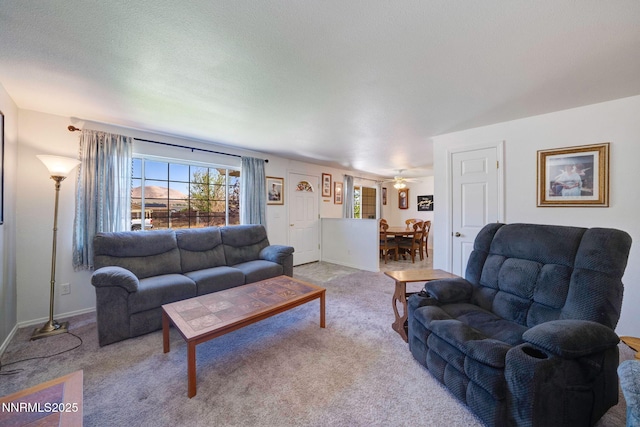 636 Aja Pl, Dayton, NV 89403 - living room featuring carpet flooring, a ceiling fan, and baseboards