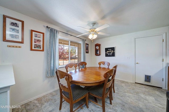 636 Aja Pl, Dayton, NV 89403 - dining space featuring a ceiling fan and baseboards