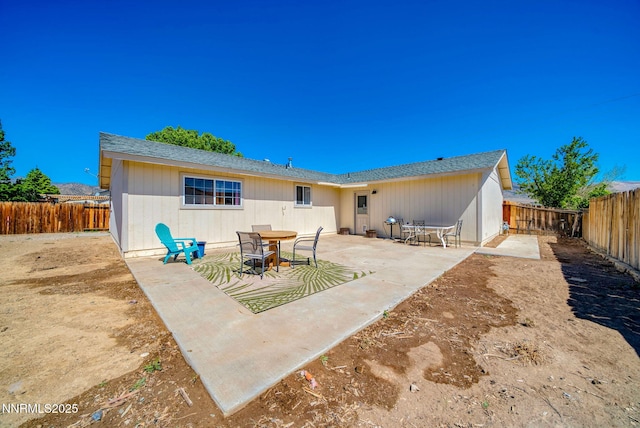636 Aja Pl, Dayton, NV 89403 - back of house featuring a fenced backyard and a patio area