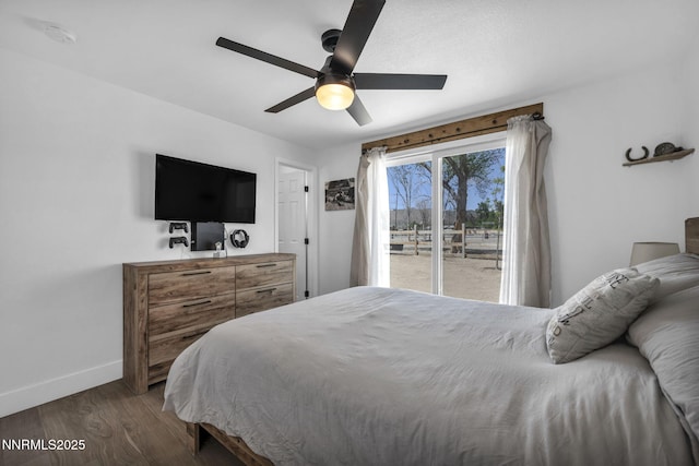 11471 Sitka St, Reno, NV 89506 - bedroom with access to exterior, dark wood finished floors, baseboards, and a ceiling fan