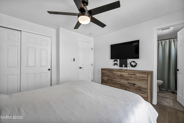11471 Sitka St, Reno, NV 89506 - bedroom with dark wood-style floors, ensuite bathroom, ceiling fan, and a closet