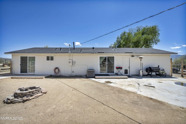 11471 Sitka St, Reno, NV 89506 - rear view of house featuring an outdoor fire pit, central air condition unit, and a patio