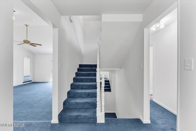 3277 Dartmouth Ct, Carson City, NV 89703 - stairway featuring carpet, ceiling fan, vaulted ceiling, and baseboards