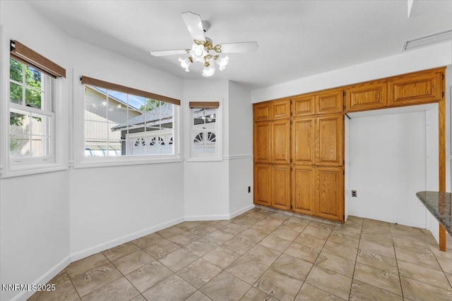 3277 Dartmouth Ct, Carson City, NV 89703 - unfurnished bedroom featuring baseboards and a ceiling fan