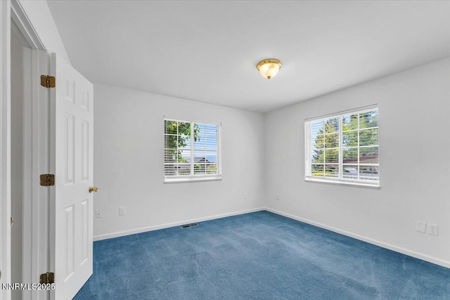 3277 Dartmouth Ct, Carson City, NV 89703 - spare room featuring healthy amount of natural light, baseboards, and carpet flooring
