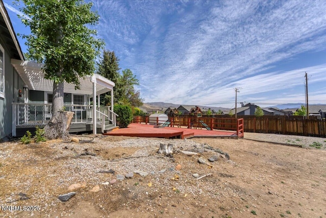 3277 Dartmouth Ct, Carson City, NV 89703 - fenced backyard featuring a wooden deck